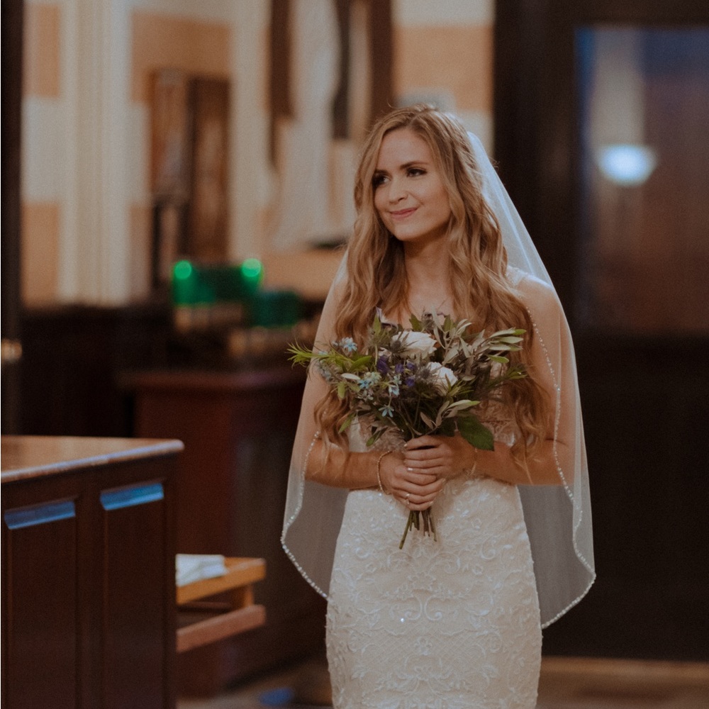Custom waist-length crystal wedding veil from Samila Bridal